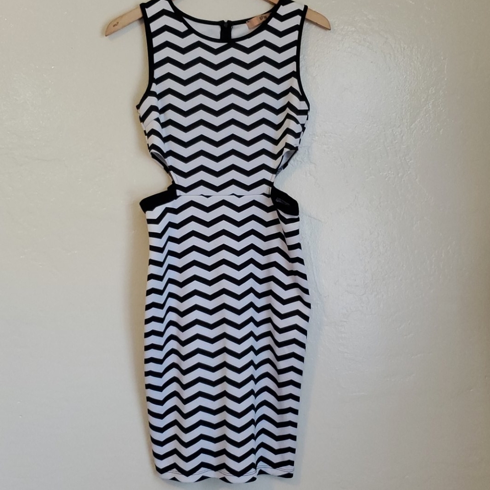 Body conscious dress with waist cutouts